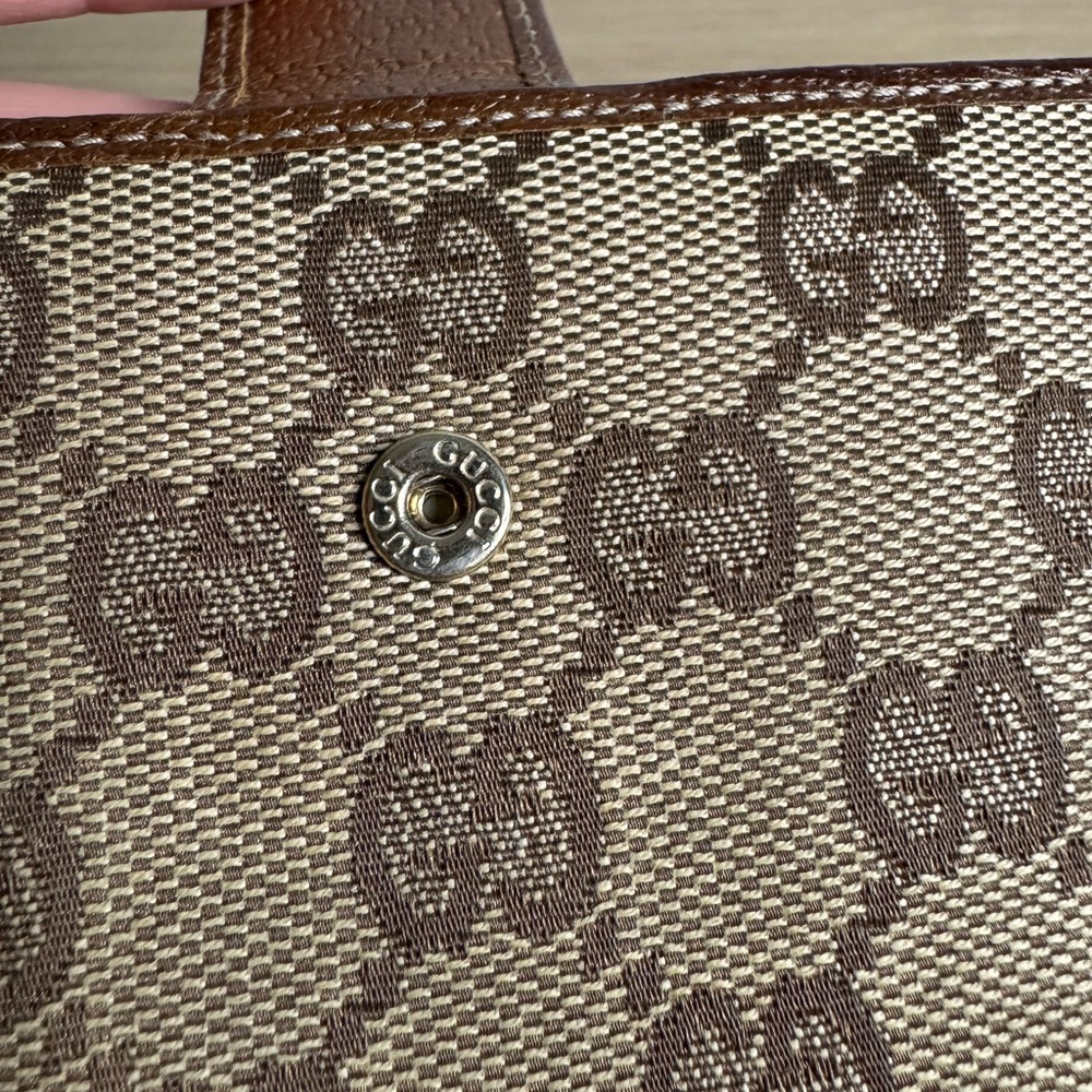Authentic Gucci Brown monogram bifold wallet - Picture 9 of 16